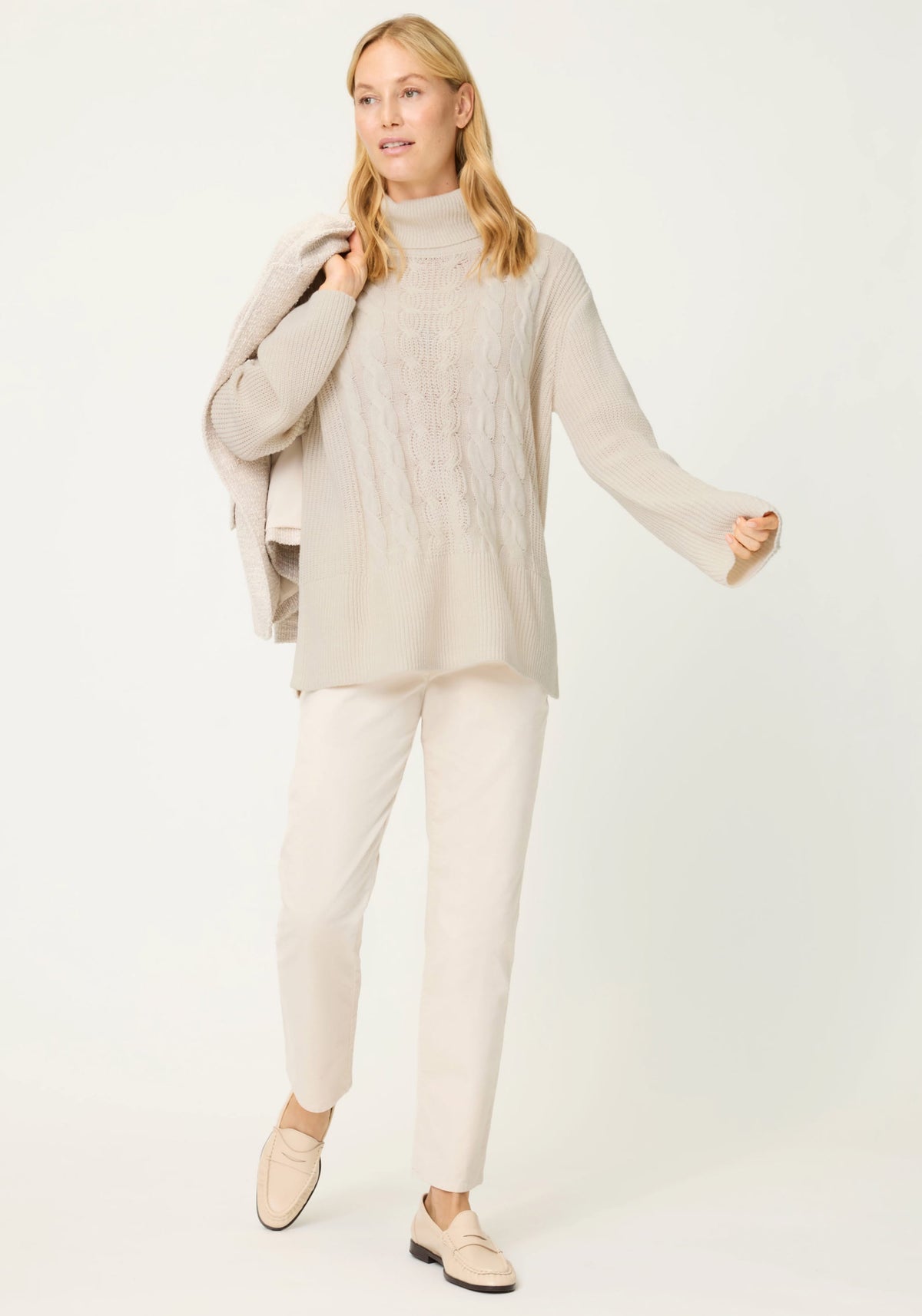 Col roulé classique en maille torsadée