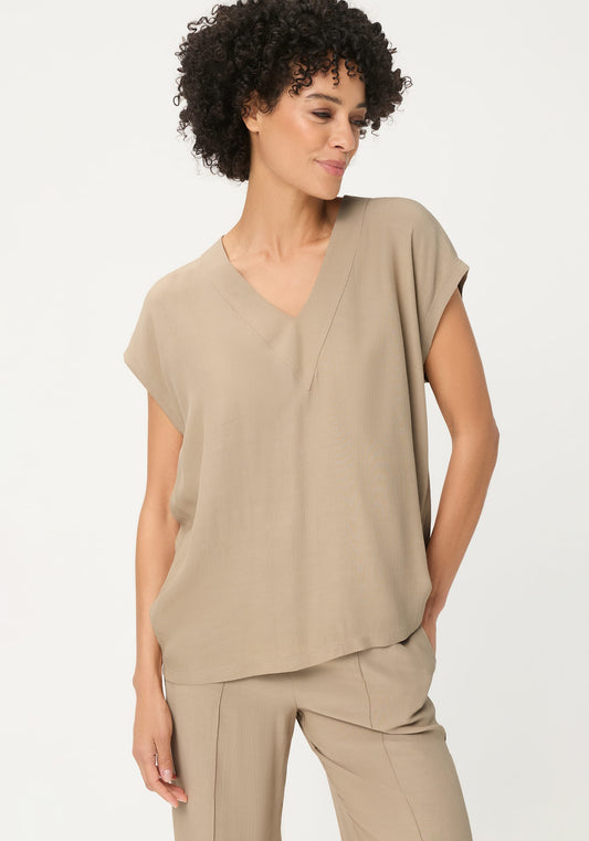 Blouse unie à col en V