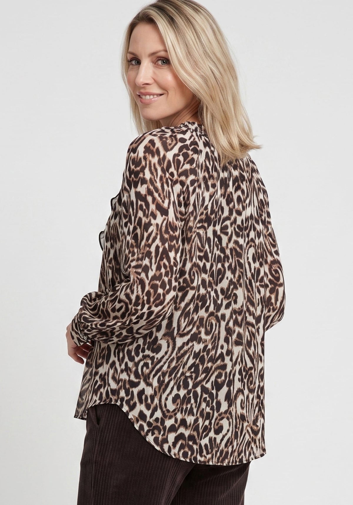 Modern Animal Print Blouse with Ruffle Trim