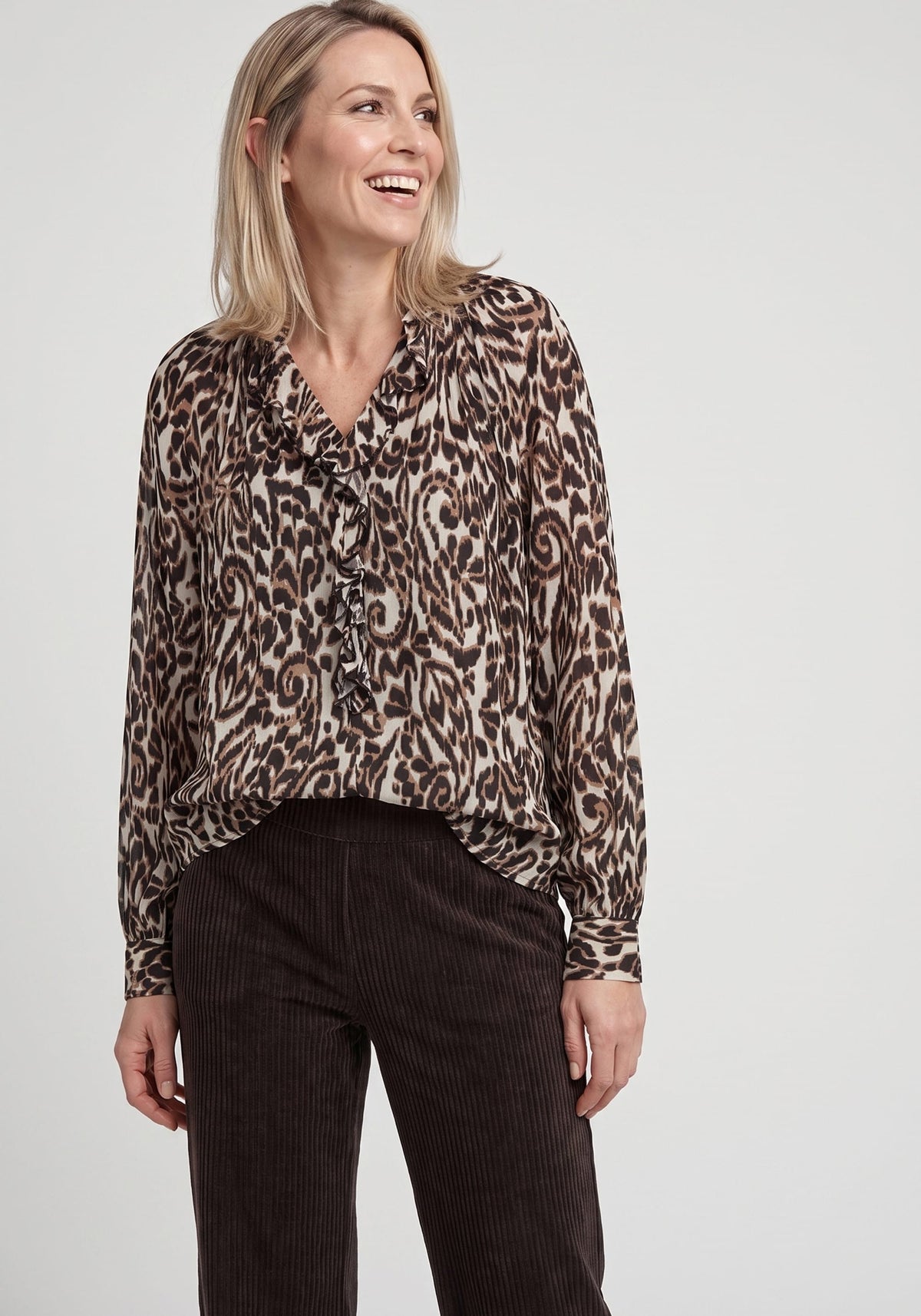 Modern Animal Print Blouse with Ruffle Trim