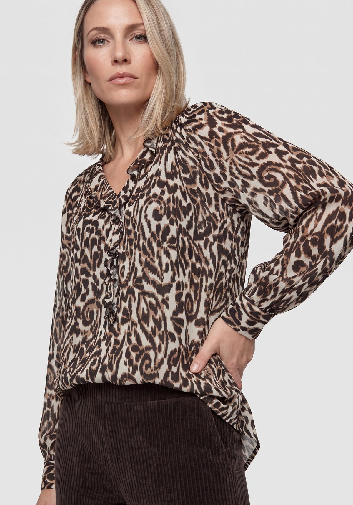 Modern Animal Print Blouse with Ruffle Trim