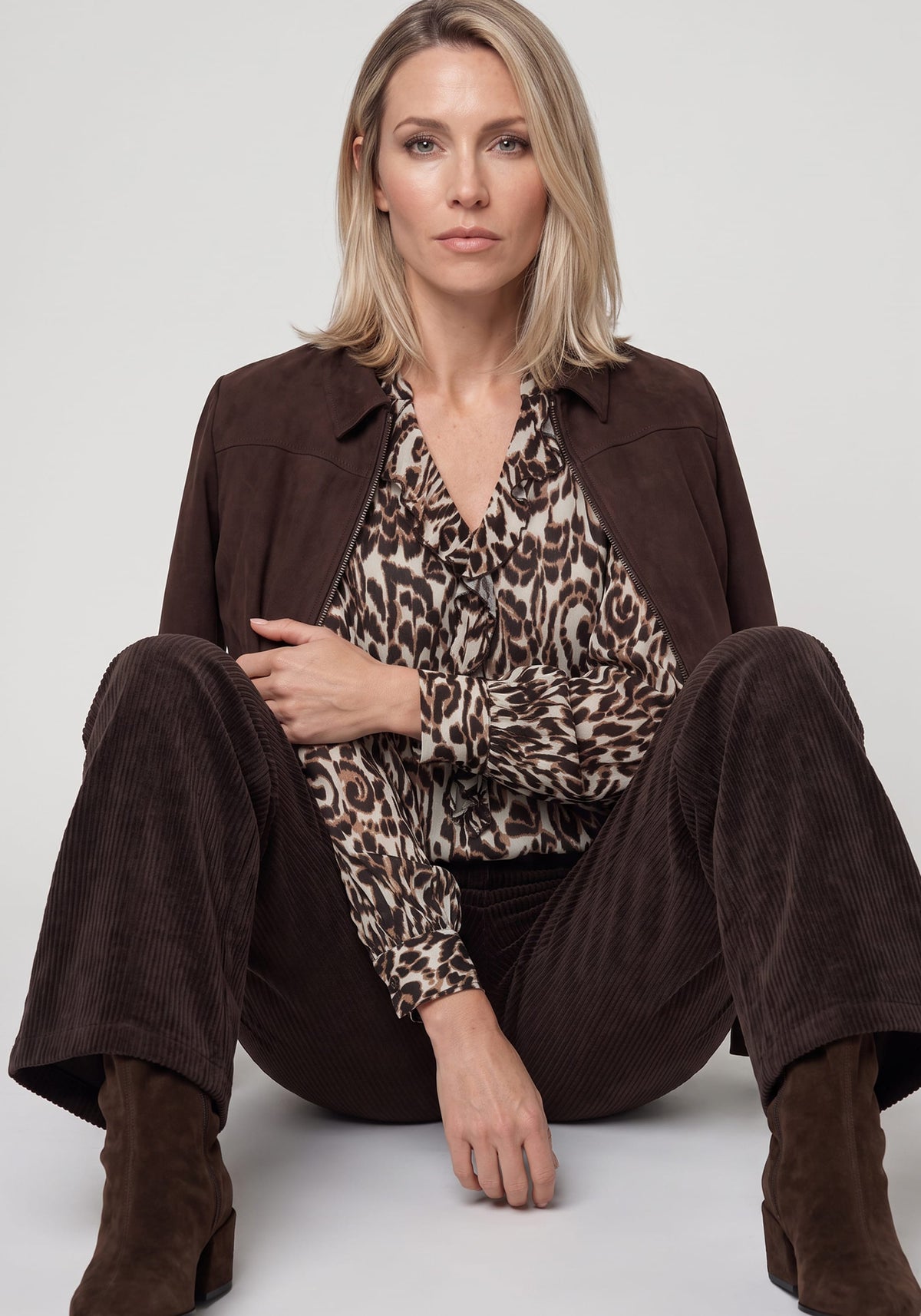 Modern Animal Print Blouse with Ruffle Trim