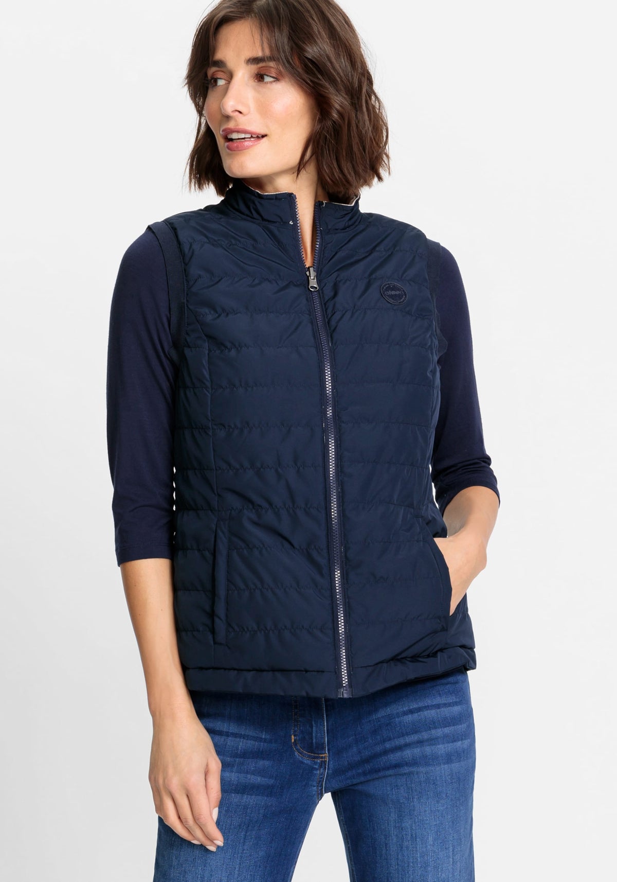 2-in-1 Reversible Quilted Vest containing REPREVE®